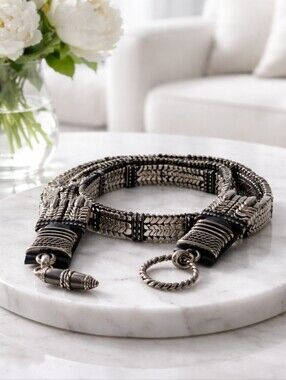 Vintage Brave metal and leather belt.